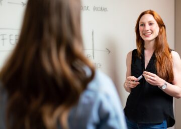 Woman teaching student