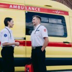 Two paramedics talking