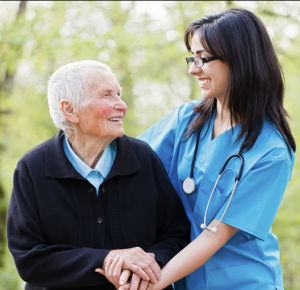 Caregiver smiling with older person